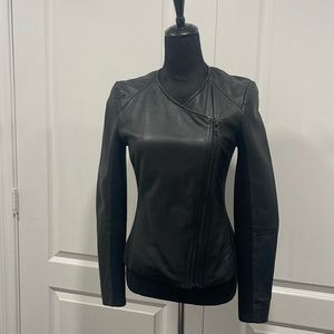 Beautiful black soft leather jacket.  Lined, Sleeve face cotton, polyester.